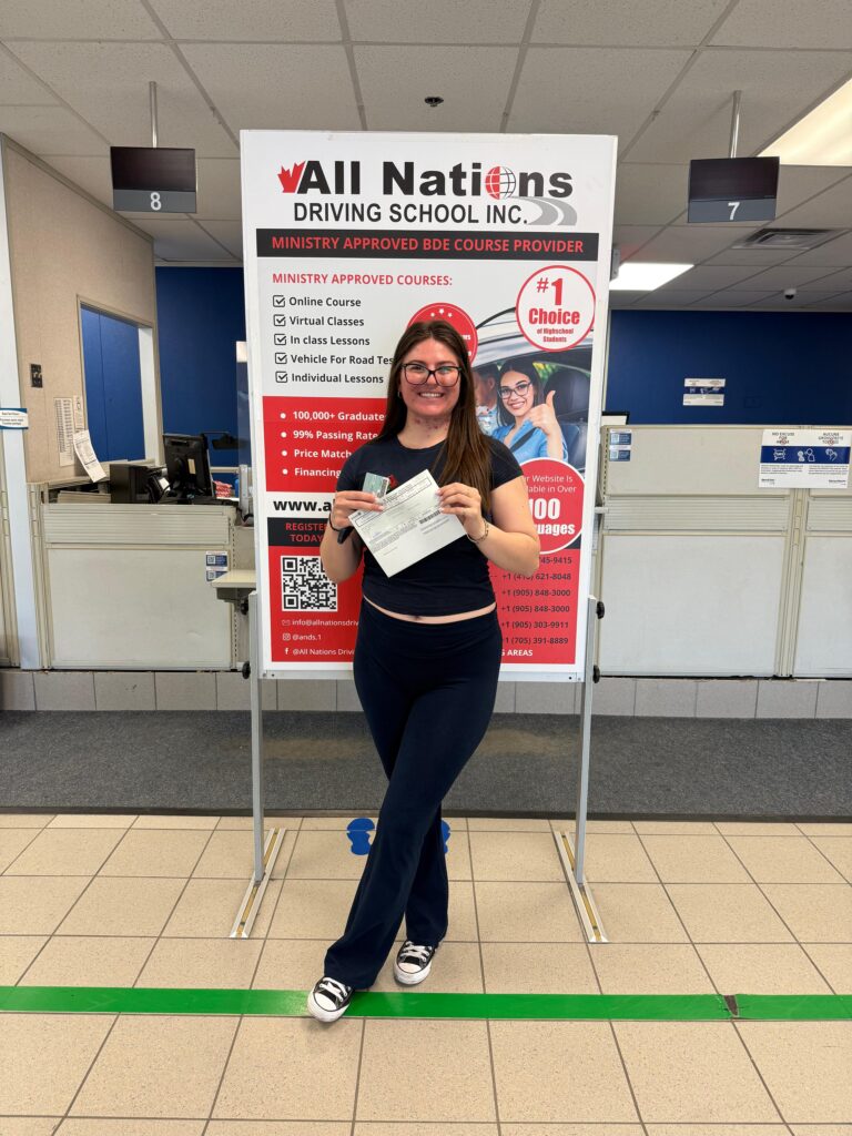 Certified driving instructor teaching safe driving skills in Maple