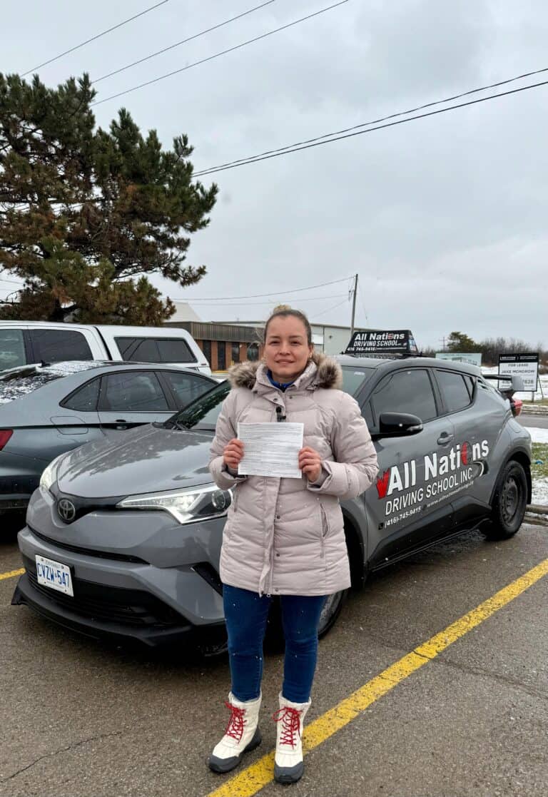 Student practicing defensive driving techniques