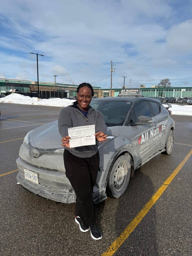 Driving school student practicing residential driving